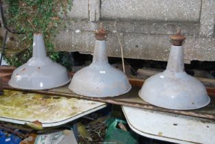 Three industrial type enamelled ceiling lights, 21'' diameter.