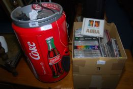 An Akura Coca Cola CD, Radio,Tape Deck Hi fi together with a box of CD's.