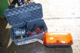 A plastic tool box with inspection lamps plus orange flashing LED beacons.