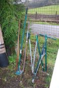 A quantity of garden tools including long arm edging shears, a garden claw,