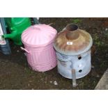 A small galvanised incinerator and a small metal waste bin.