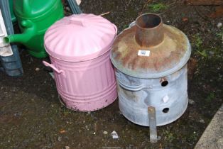 A small galvanised incinerator and a small metal waste bin.