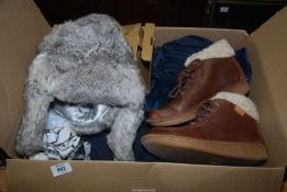 A Norka trap hat, a rabbit fur hat, velvet trousers, suede gloves, a pair of Clarks boots size 8,