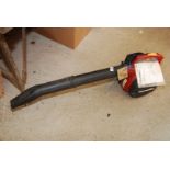 A Homelite petrol blower vac with manual, good compression.