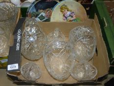 Six cut glass crystal flower baskets and four Bradex plates.