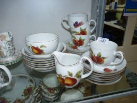 A quantity of Royal Worcester 'Evesham' to include; six dessert bowls, five side plates, sugar bowl,