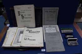 A leather case containing music books including; 'The Mikado', 'Songs of the Hebrides', etc.