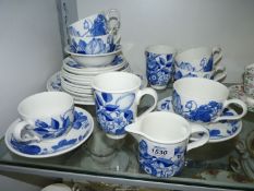 A quantity of Portmeirion 'Blue Harvest' china including; mugs, breakfast and tea cups & saucers,