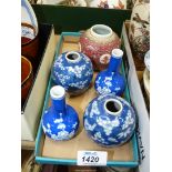 A pair of Chinese hand painted prunus pattern bottle vases,