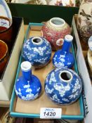 A pair of Chinese hand painted prunus pattern bottle vases,