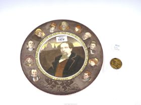 A Royal Doulton Charles Dickens plate with a Dickens medallion.