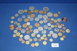 A box of Foreign and old Great British coins.
