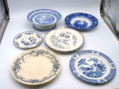 A quantity of blue and white china to include a cake stand [possibly J.