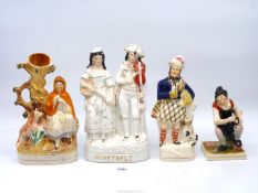 Four Staffordshire figures including three flatbacks; 'Minstrels',