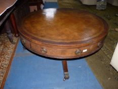 A nice quality low Mahogany Drum Table having an inset brown leather top with gold tooling,