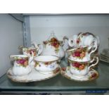 A Royal Albert 'Old Country Roses' tea service including; teapot, six cups and saucers,