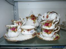 A Royal Albert 'Old Country Roses' tea service including; teapot, six cups and saucers,