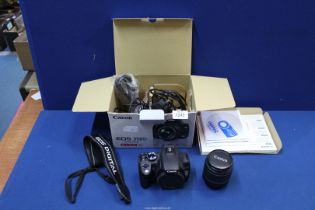 A Canon E0S 350D DSLR boxed kit including; body, EF-S 18-55mm lens, charger, 1GB memory card,