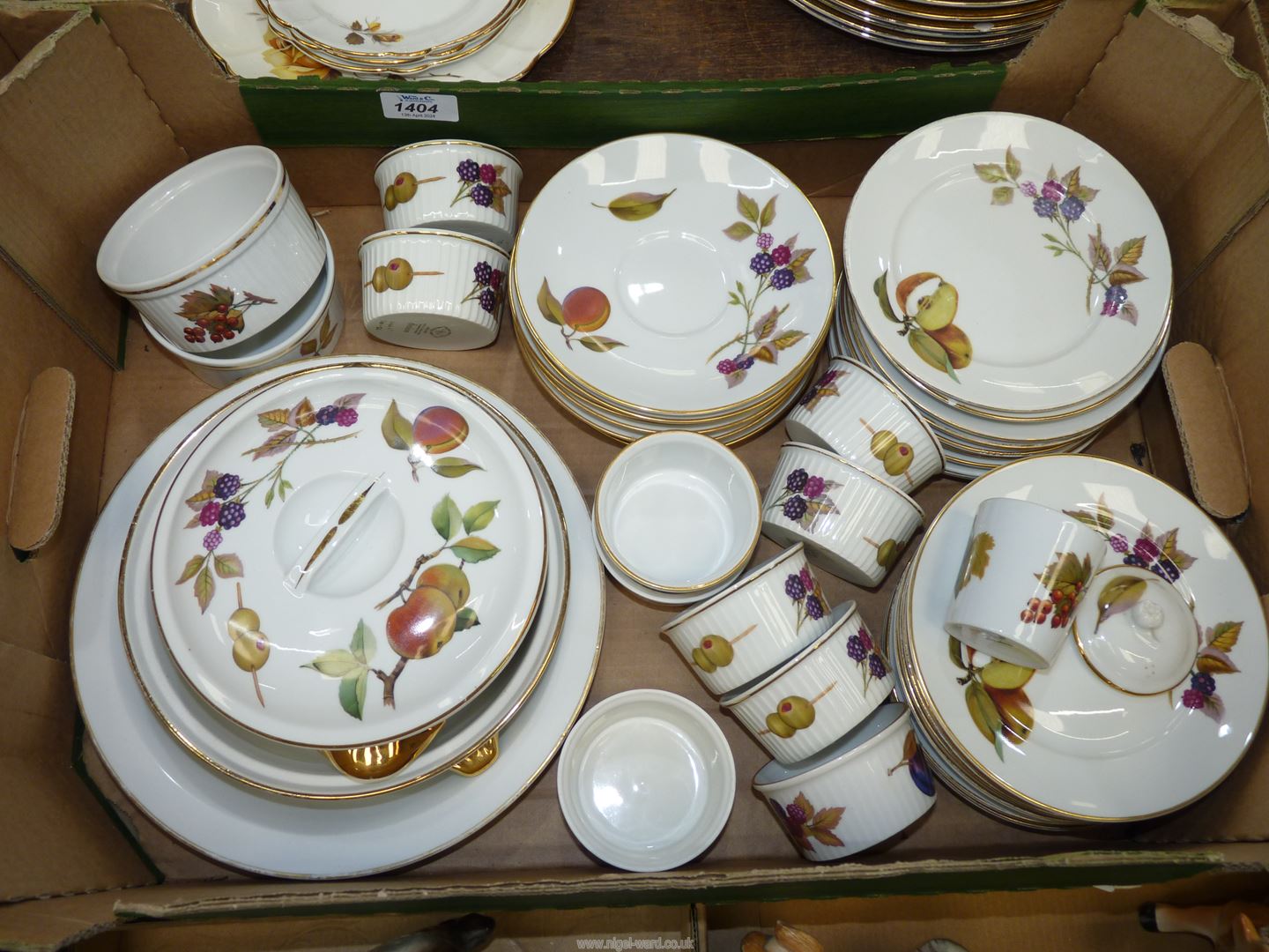 A quantity of Royal Worcester 'Evesham' saucers, tea plates, pie plate, ramekins, etc.