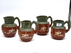 Four green and brown Langley ware horse and hound stoneware Jugs, circa 1930's.