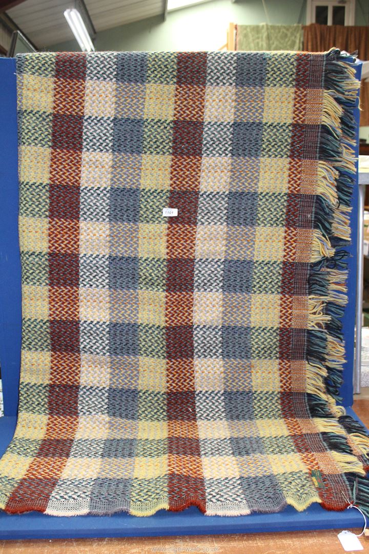 A 'Tweedmill' all wool single Blanket in multi-colour checks and flecks.