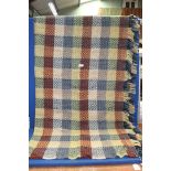 A 'Tweedmill' all wool single Blanket in multi-colour checks and flecks.