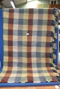 A 'Tweedmill' all wool single Blanket in multi-colour checks and flecks.