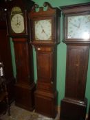An elegant cross-banded and light/darkwood strung Longcase Clock,