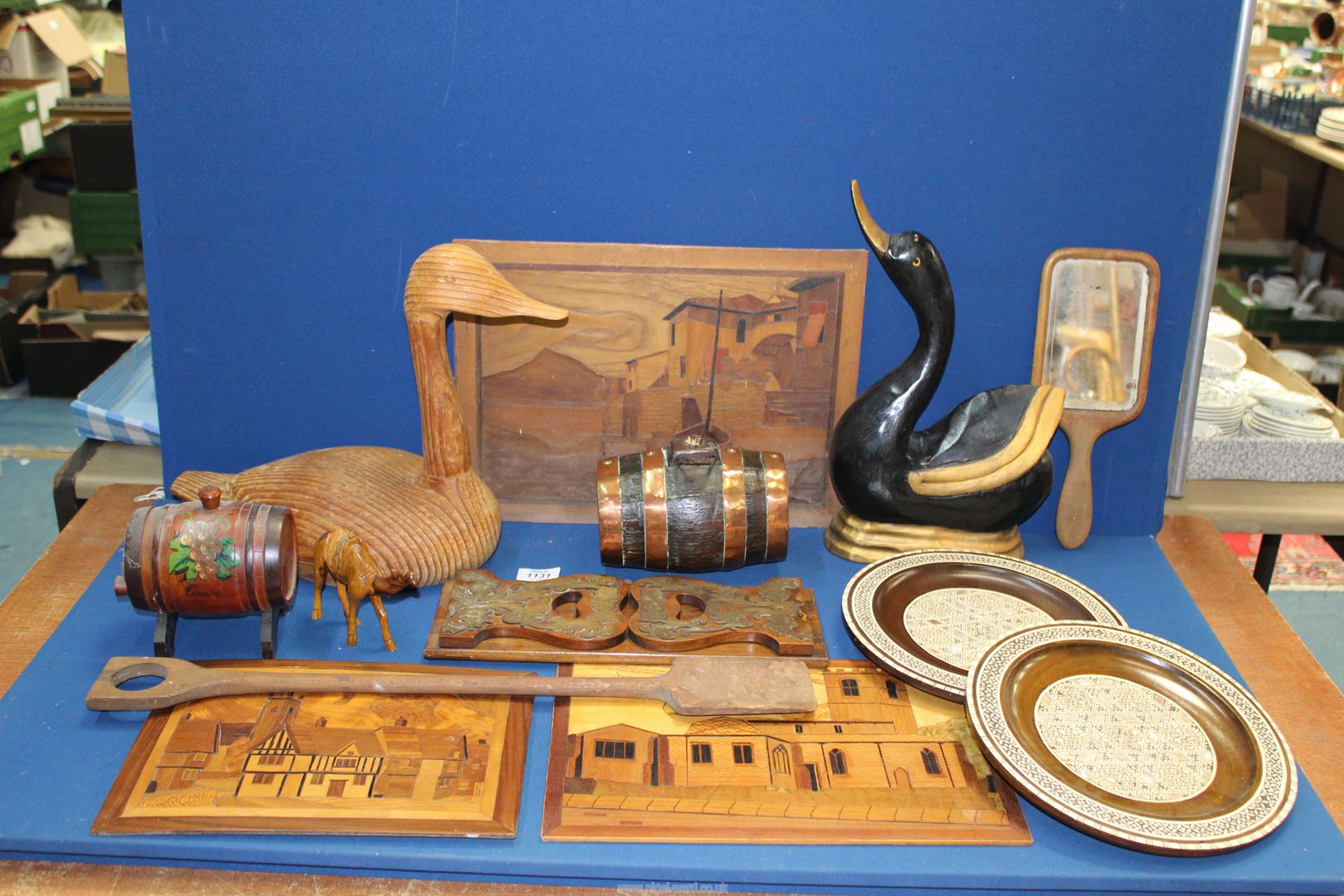 A quantity of treen including ducks, marquetry pictures, copper coopered barrel, etc.