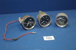 Three Smiths dashboard gauges for 2'' diameter recesses including 'Amps',