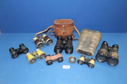 A small quantity of field glasses incl. two cased pairs, one made in France, some a/f.