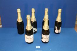 Six bottles of Moscato Spumante sparkling wine.