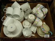 A 'Crown Staffordshire' floral part tea set to include six teacups and saucers,