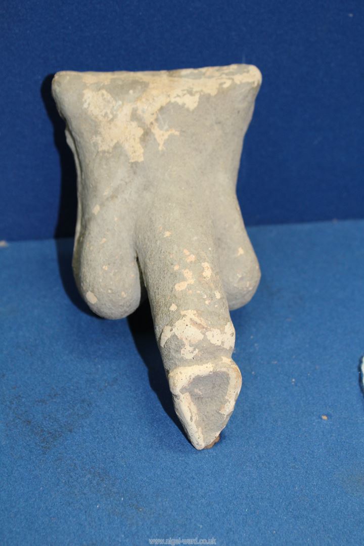 A Roman votive pottery fertility symbol applique in the form of the male genitalia, Imperial period,