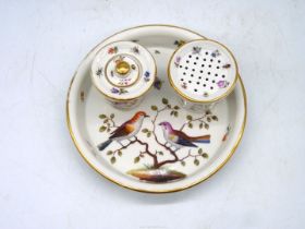 An antique continental porcelain desk set with tray and attached ink well with lid and a sander.