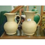 Two large Moira Pottery Hillstonia jugs, 9 1/2" and 10 1/4" tall.