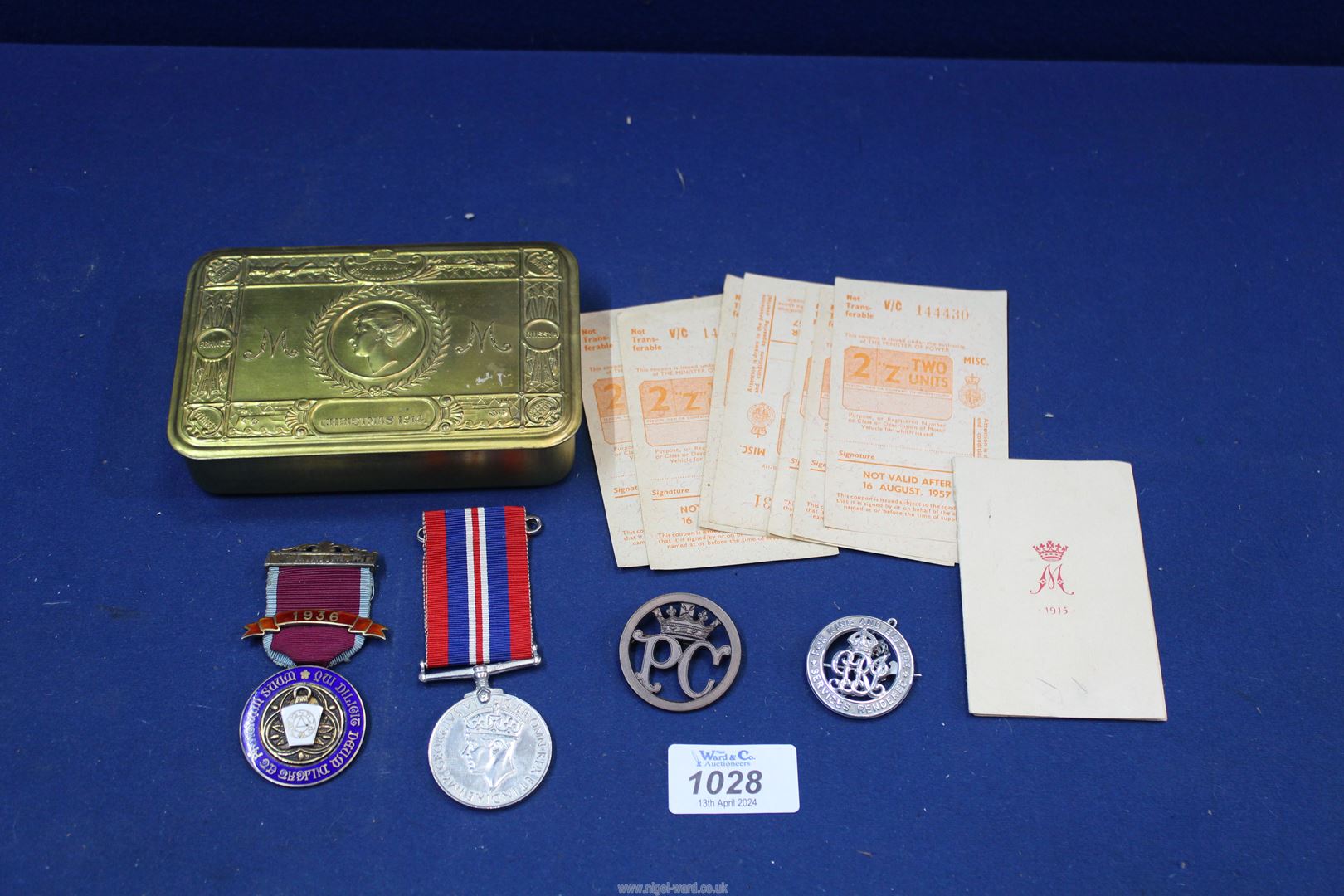 A repro brass Christmas Tin, General Service medal,