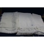 Three antique white cotton bed spreads.