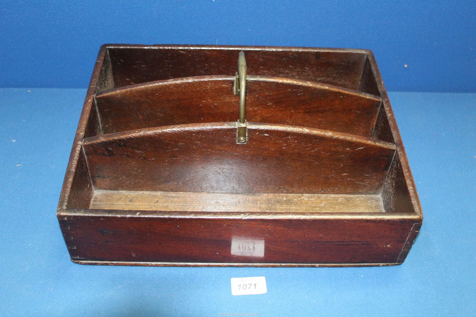 A 19th century three section cutlery box with brass handle, 12" x 15".