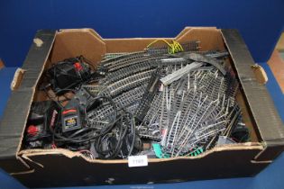 A good quantity of 'OO' gauge track plus power units, etc.