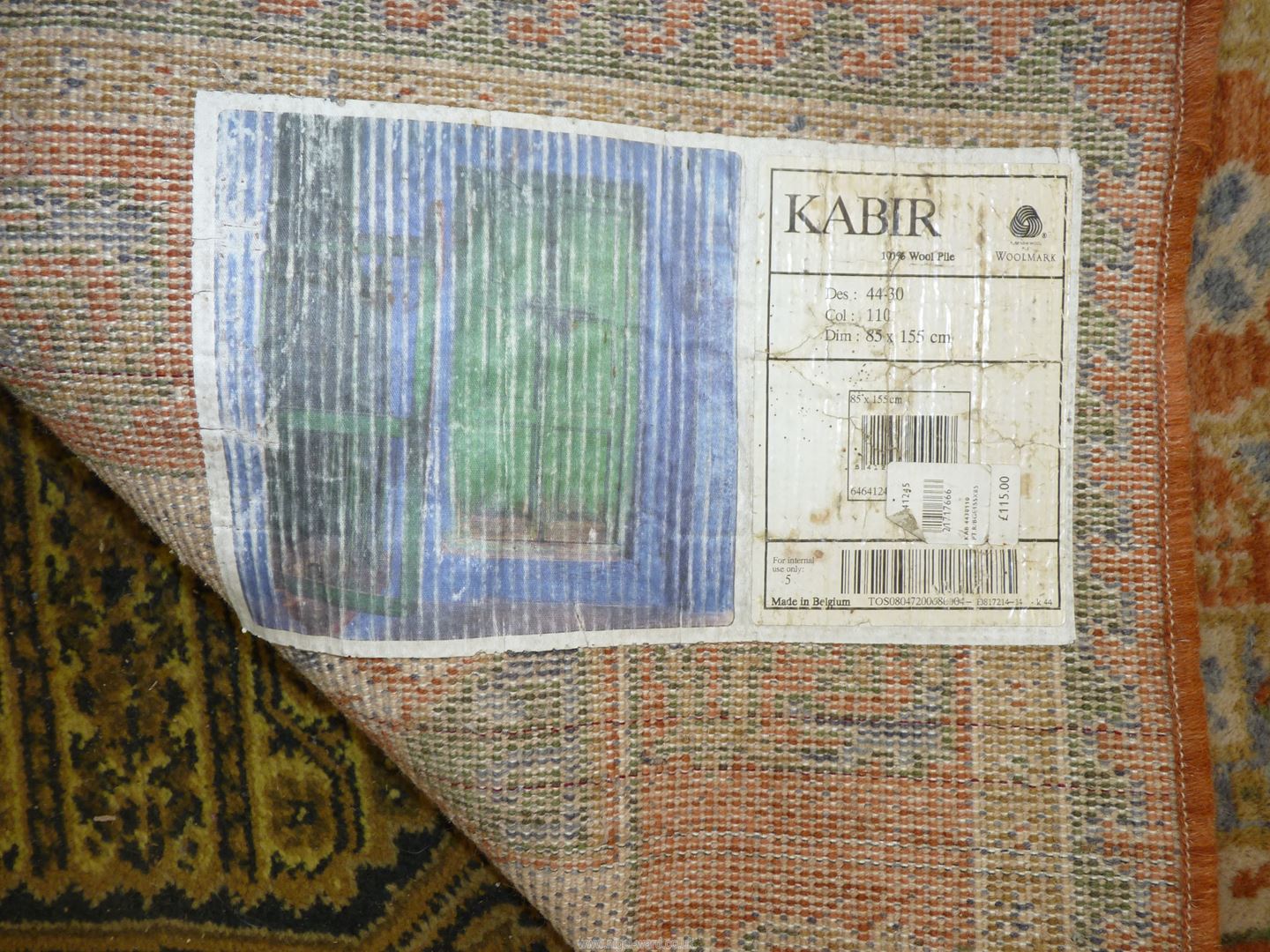 A Kabir pure wool hearth rug with borders of symbolic patterns in terracotta, - Image 3 of 3