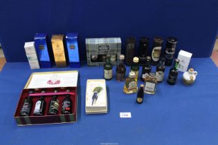 A small quantity of Alcohol miniatures including; Port and Whisky (some in tins and boxes).