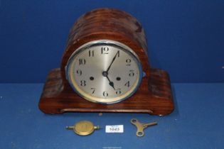 A Mantle clock, 12'' wide x 8 1/2'' high,