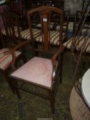 A delicate Mahogany framed open armed Elbow Chair standing on tapering square front legs and having