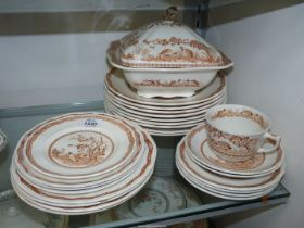 A box of 'Brown Quail' china including eight dinner plates, four side plates, five tea plates,