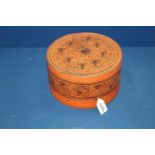 A circa 1900 Burmese Bagan red lacquered round Betel Nut box, 7 1/2'' diameter x 4'' high. a/f.