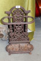 A cast iron umbrella stand, 20" wide x 19 1/4" high.