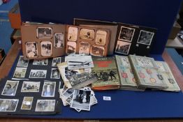 A quantity of miscellanea including albums of black and white photographs,