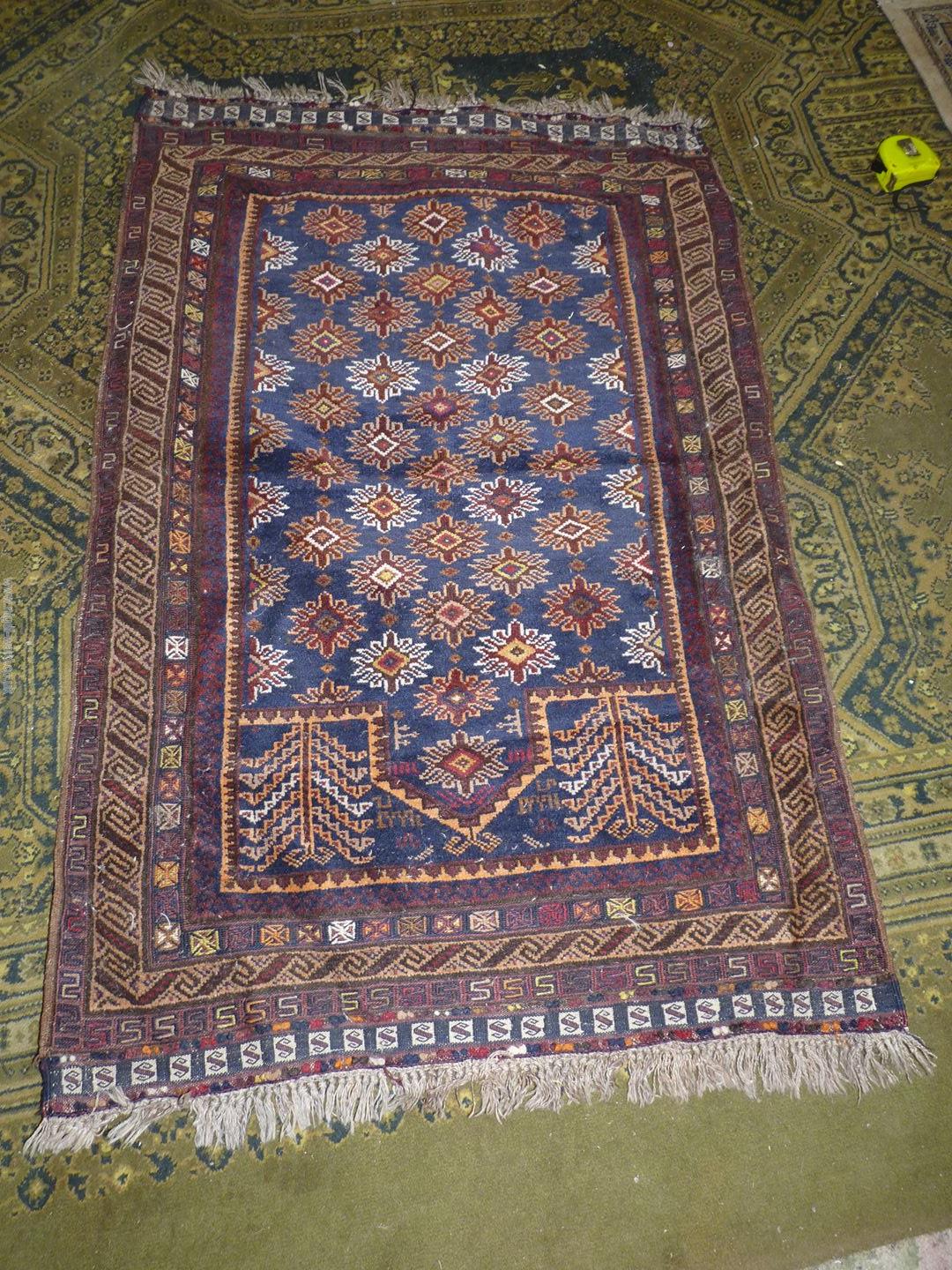 A Kayam Prayer rug, the border having hand stitched geometric detail, 45'' x 34''.