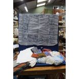 A quantity of linen including three white Damask table clothes, linen table cloths,